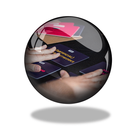 Image of people using the Gen AI cards in an AI workshop to learn how to better apply AI thinking.